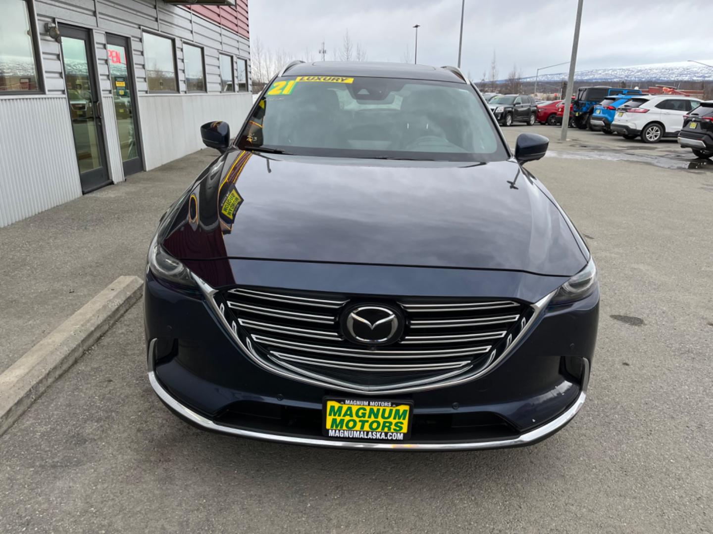 2021 Blue Mazda CX-9 Grand Touring AWD (JM3TCBDY8M0) with an 2.5L L4 DOHC 16V engine, 6A transmission, located at 1960 Industrial Drive, Wasilla, 99654, (907) 274-2277, 61.573475, -149.400146 - Photo#7